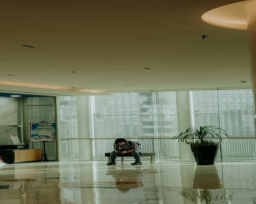 Elegant entrance lobby of a professional corporate tower in central Jakarta district